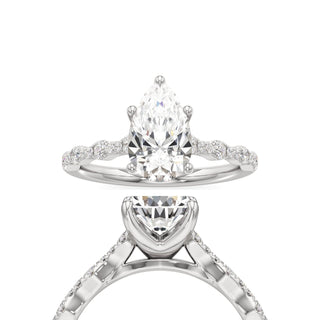 Kairi Elongated Cushion Station Diamond Band